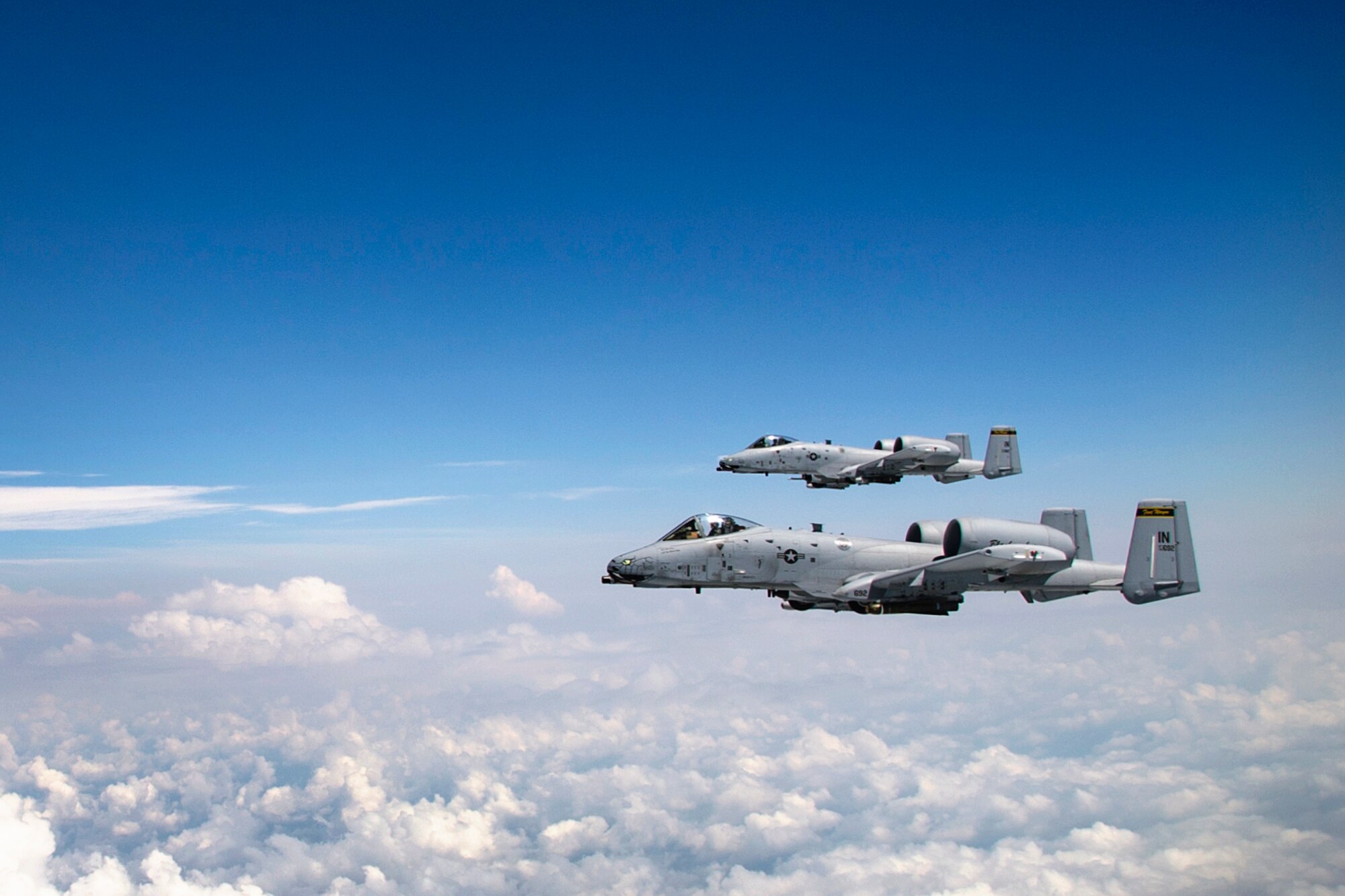 Two A-10 Warthogs from the 122nd Fighter Wing, Fort Wayne, Ind., form up parallel to a KC-135R Stratotanker during an Indiana Employer Support of the Guard and Reserve event at Grissom Air Reserve Base, Ind., Aug. 19, 2016. More than 40 people, nominated by Guard and Reserve members from the 434th ARW, the 122th Fighter Wing in Fort Wayne, Ind., and the 181st Intelligence Wing in Terre Haute Ind., had a hand-on tour of the base that concluded with an air refueling mission. (U.S. Air Force photo/Staff Sgt. Katrina Heikkinen)
