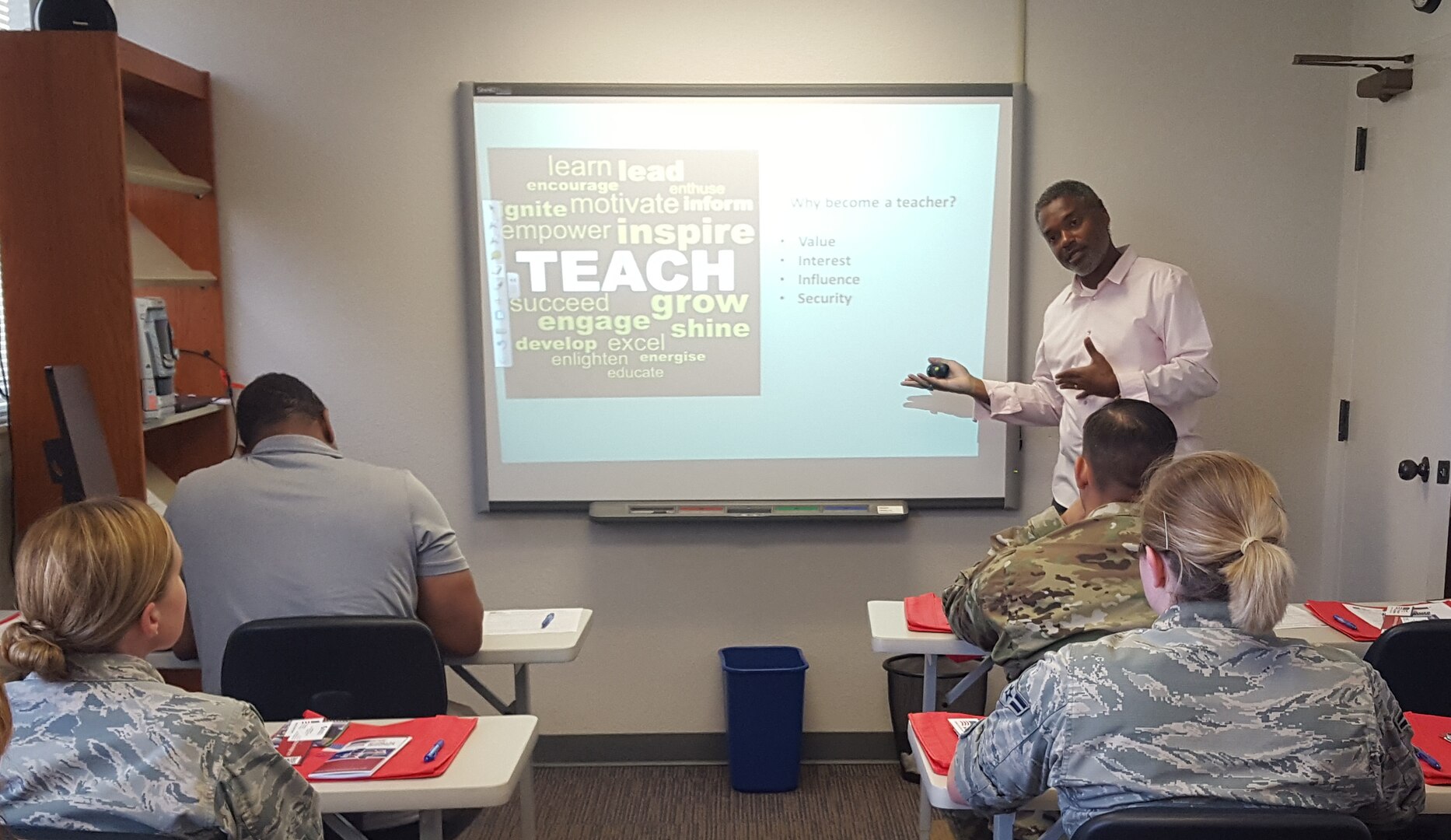 Ronald Holmes, program specialist for the Troops to Teachers program, encourages veterans to consider teaching careers during a June 24, 2016, workshop at Joint Base San Antonio-Lackland, Texas.