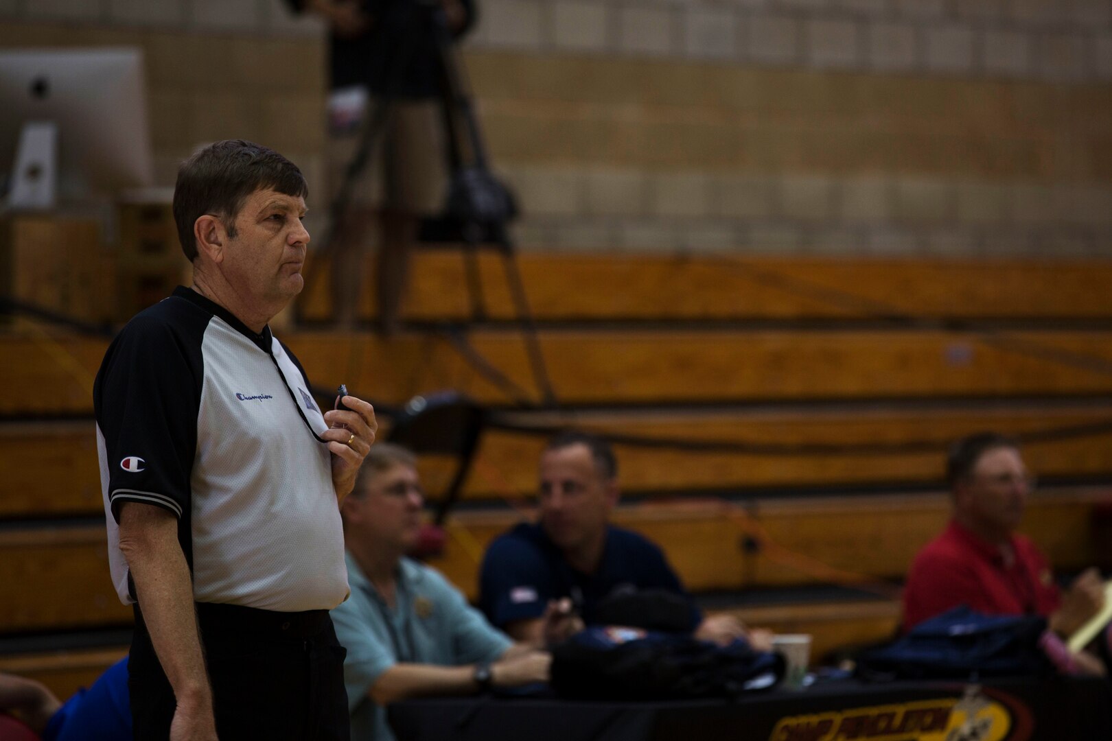 Head Referee Pat Rosenow watches the Brazil vs. France game at the Conseil International Du Sport Militaire (CISM) World Military Women’s Basketball tournament July 28 at Camp Pendleton, California. The base is hosting the CISM World Military Women’s Basketball Championship July 25 through July 29. The event is an opportunity for high-caliber U.S. service member athletes to be positively engaged with their peers from nations around the globe. (U.S. Marine Corps photo by Sgt. Abbey Perria)