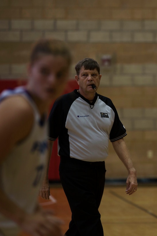 Head Referee Pat Rosenow observes the Brazil vs. France game at the Conseil International Du Sport Militaire (CISM) World Military Women’s Basketball tournament  July 28 at Camp Pendleton, California. The base is hosting the CISM World Military Women’s Basketball Championship July 25 through July 29 to promote peace activities and solidarity among military athletes through sports. The United States is hosting teams from Brazil, Canada, China, France, and Germany.  (U.S. Marine Corps photo by Sgt. Abbey Perria)