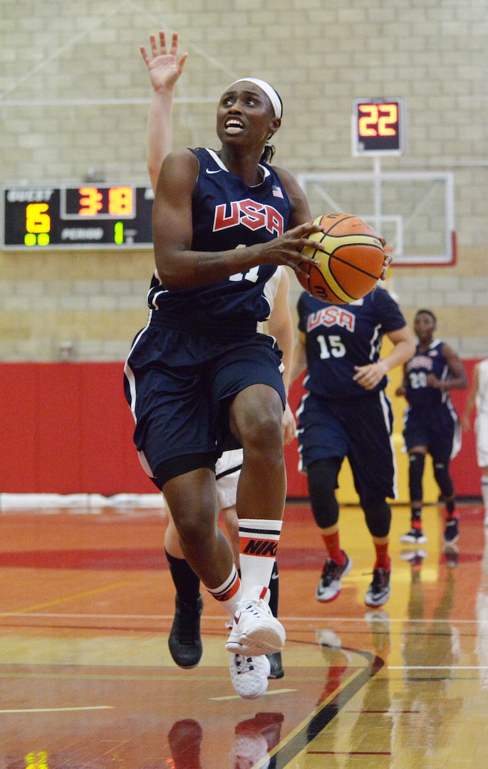 Creshenda Singletary breaks downcourt to score two points for Team USA against Germany during CISM women's basketball at Camp Pendleton, July 28, 2016. Singletary of Fort Bragg, N.C., was the game's leading scorer with 16 points as USA beat Germany 93-37.