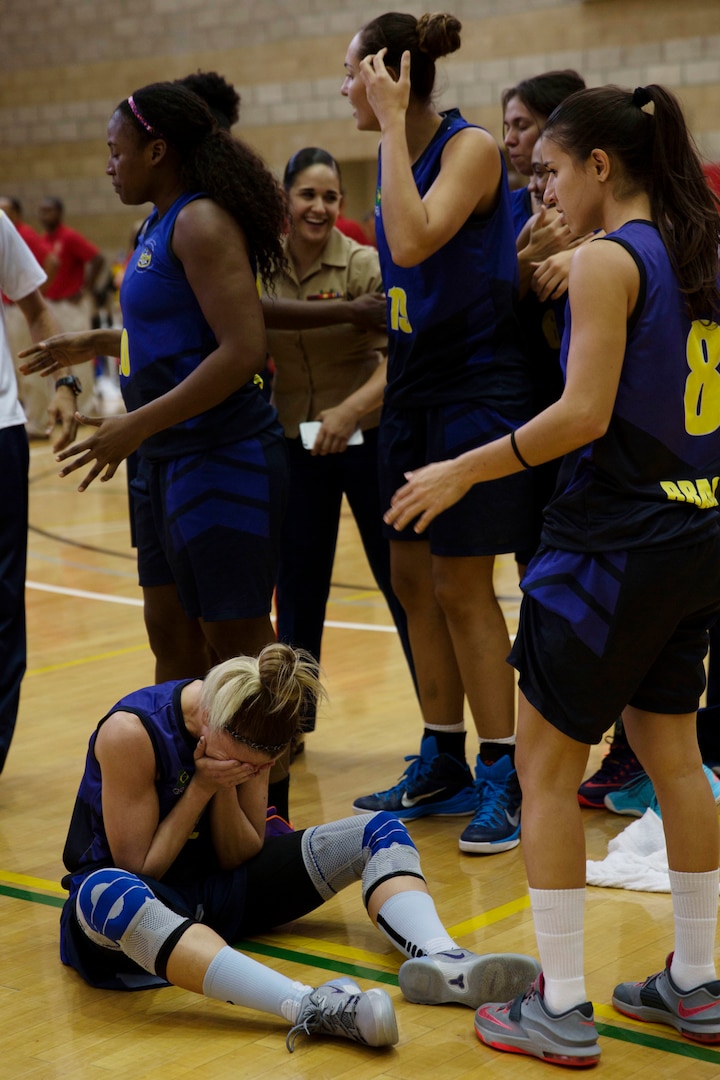 Team Brazil celebrates after winning the final game at the Conseil International Du Sport Militaire (CISM) World Military Women’s Basketball Championship July 29 at Camp Pendleton, California.  The tournament ended July 29, with Brazil defeating the United States’ team in the final seconds, taking home the gold.  The United States took second place, and China will return home with the bronze.  The French team was awarded the CISM Fair Play Award for their hard work on the court, and their esprit de corps.  The base hosted the CISM World Military Women’s Basketball Championship July 25 through July 29 to promote peace activities and solidarity among military athletes through sports.  (U.S. Marine Corps photo by Sgt. Abbey Perria)
