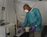 FORT MCCOY, Wis. – U.S. Army Reserve Soldier, Spc. Billy Dunn, a dental specialist, with the 965th Dental Company, Seagoville, Texas, and a Dallas, Texas native, prepares dental equipment for sterilization during the Global Medic Exercise at Fort McCoy, Aug. 20, 2016. More than 60 965th Soldiers took part in the exercise to hone their field operations skillset. (U.S. Army Reserve photo by Sgt. Quentin Johnson, 211th Mobile Public Affairs Detachment/Released)