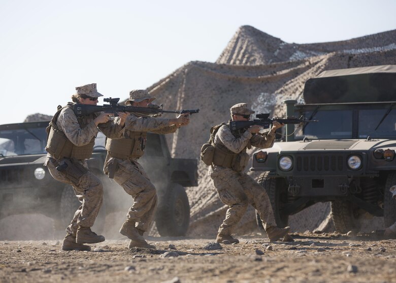 U.S. Marines with Company A, Law Enforcement Battalion, I Marine Expeditionary Force Headquarters Group, practice weapons tactics training during I Marine Expeditionary Force Large Scale Exercise 2016 at Marine Corps Air Station Miramar, Calif., Aug. 17, 2016. LSE-16 is designed to enhance the command and control and interoperability between I MEF command element staff and its higher, adjacent and subordinate command headquarters. The exercise includes cyber and electronic warfare, information support operations, and simulated and live-fire events. (U.S. Marine Corps photo by Sgt. Tia Dufour)