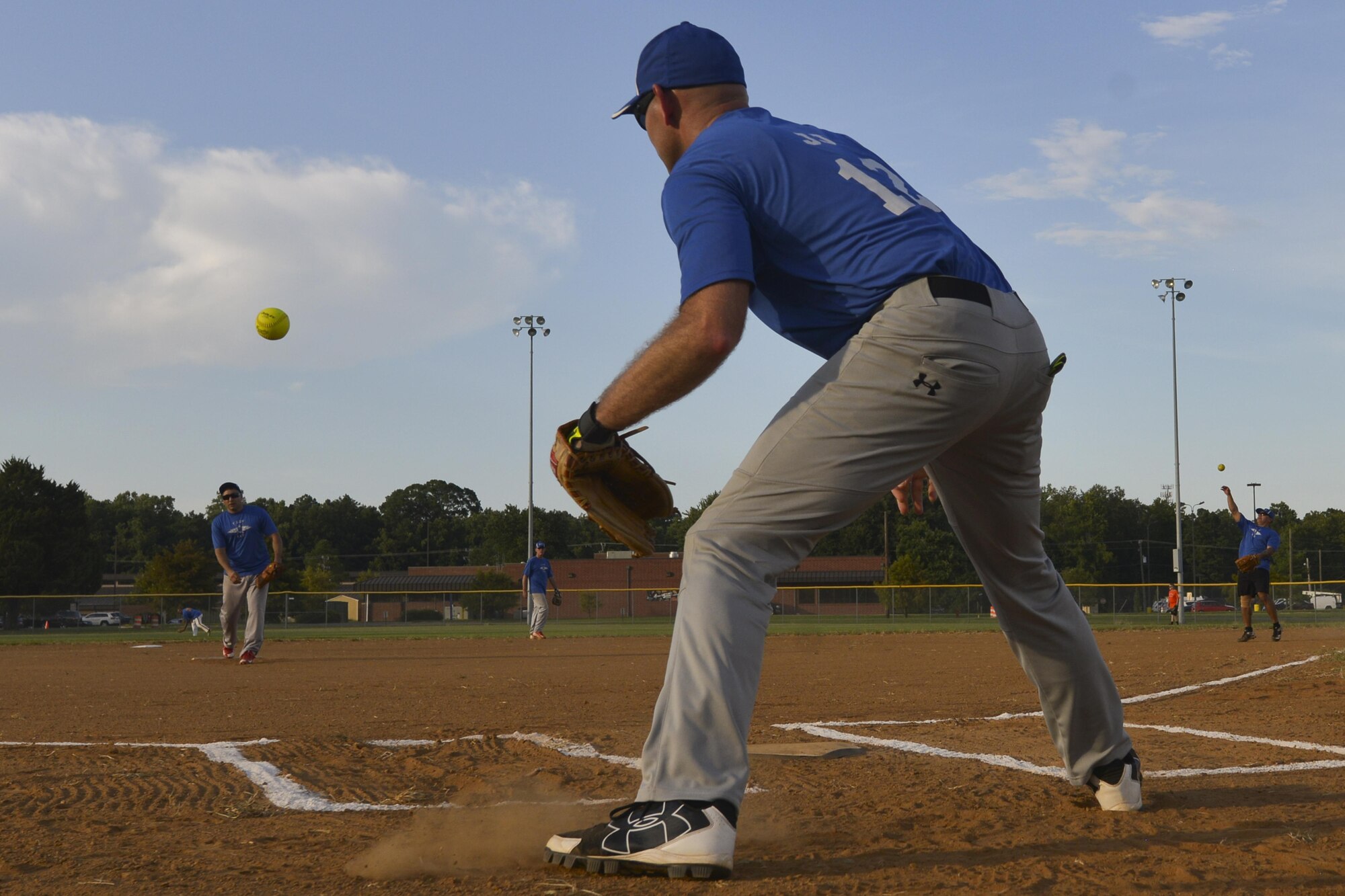 The Fort Eustis All-Stars warm up before manning bases during the Joint Base Langley-Eustis Commander’s Cup Softball Championship at Fort Eustis, Va., Aug. 17, 2016. The Commander’s Cup is an ongoing competition between Fort Eustis and Langley Air Force Base which takes place at the end of each intramural season to promote camaraderie between the joint installations. (U.S. Air Force photo by Staff Sgt. Nastasha Stannard)