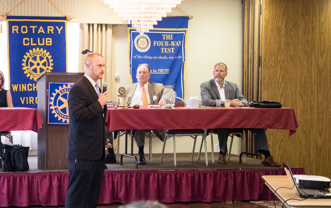 Joey Behr, a project manager with the U.S. Army Corps of Engineers, Middle East District addresses the Rotary Club of Winchester during their monthly luncheon Aug. 11 at the Travelodge in Winchester.