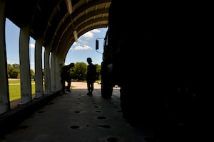 Maritime and Intermodal Training Department students leave Training Area 9 after completing an air movement exercise at Fort Eustis, Va., Aug. 22, 2016.  Cargo specialists are responsible for transferring or supervising the transfer of passengers, cargo and equipment to and from air, land and water. (U.S. Air Force photo by Staff Sgt. Natasha Stannard)