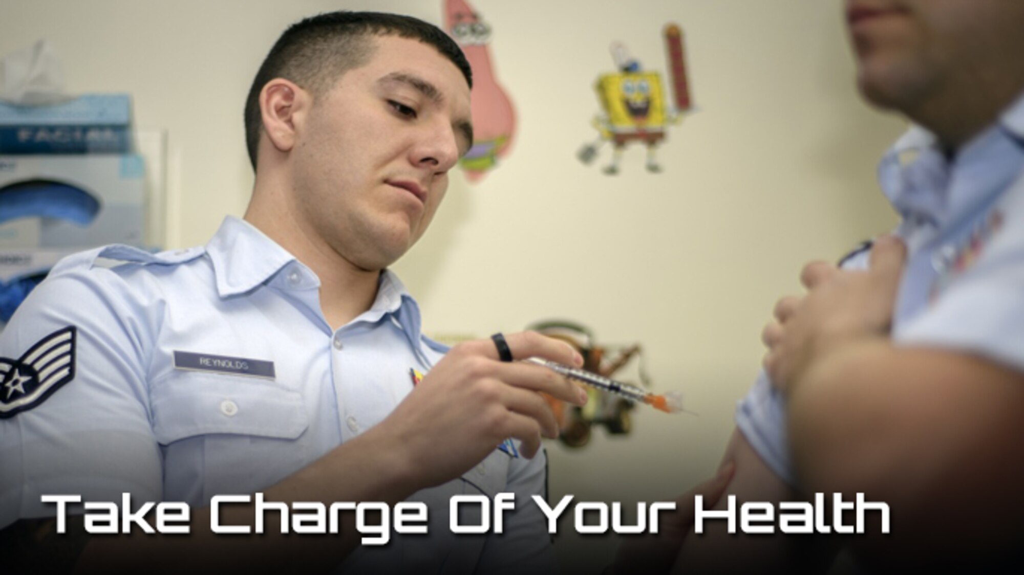 Staff Sgt. Derrick Reynolds, a 71st Medical Operations Squadron technician, vaccinates an Airman at the immunizations section of the clinic at Vance Air Force Base, Okla., Jan. 4. (Photo by David Poe, Graphic illustration by Steve Thompson) 