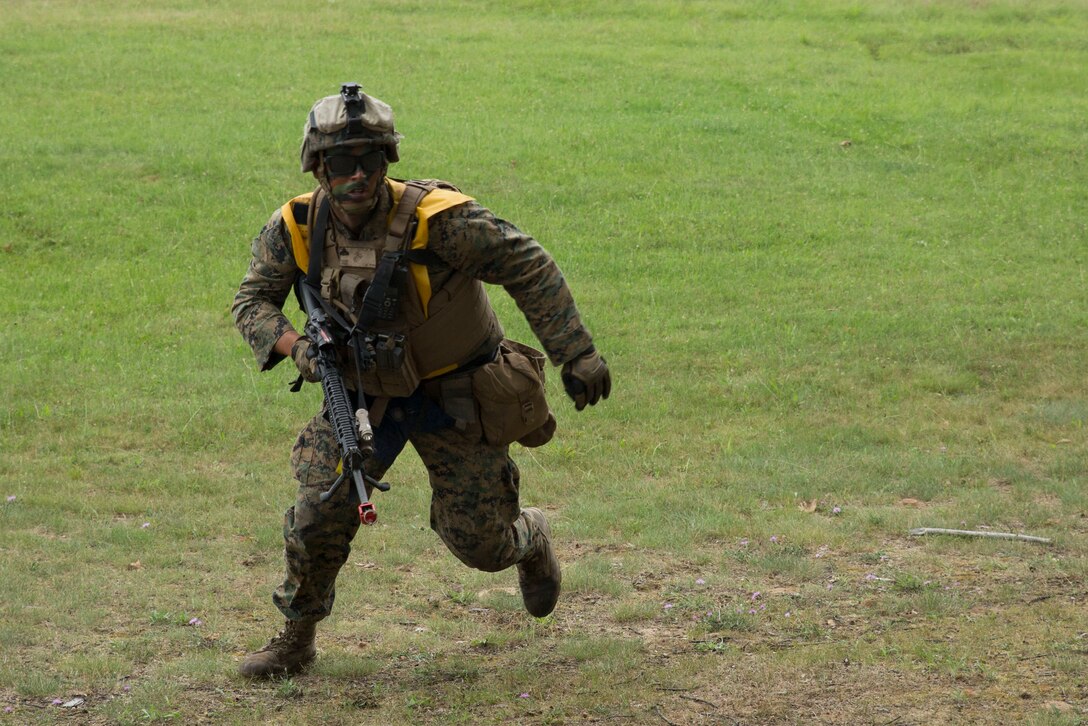 CAMP GRAYLING, Mich. -- A Marine with 4th Assault Amphibian Battalion, 4th Marine Division, Marine Forces Reserve, practices his maneuver under fire during Exercise Northern Strike 2016 at Camp Grayling Joint Maneuver Training Center, Mich., Aug. 17, 2016. The exercise also included infantry training techniques and military operations in urban terrain.  Exercise Northern Strike Northern Strike 16 is a National Guard Bureau-sponsored exercise uniting approximately 5,000 Army, Air Force, Marine, and Special Forces service members from 20 states and three coalition countries. The exercise strives to provide accessible, readiness-building opportunities for military units from all service branches to achieve and sustain proficiency in conducting mission command, air, sea, and ground maneuver integration, and the synchronization of fires in a joint, multinational, decisive action environment. (U.S. Marine Corps photo by Cpl. Devan Alonzo Barnett/Released)
