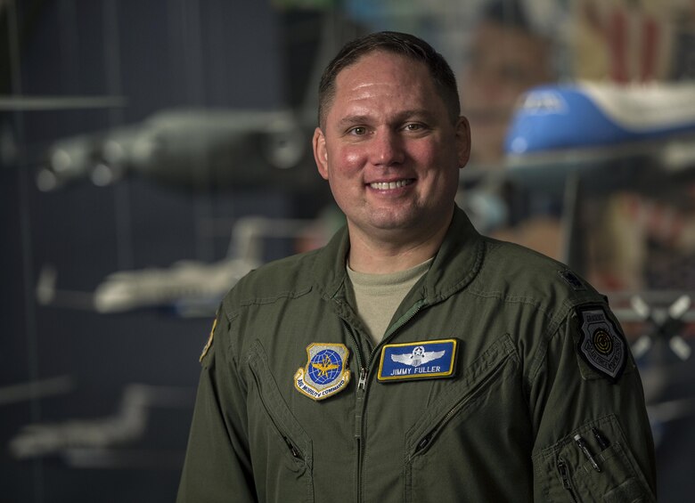 Lt. Col. Jimmy Fuller, the 18th Air Force combat operations division director at Scott Air Force Base, Ill., has worked to streamline the Joint Airborne/Air Transportability Training program, an online system used by military units to request air support. (U.S. Air Force photo/Master Sgt. Brian Ferguson) 