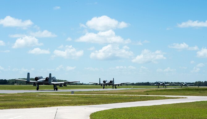 A-10C Thunderbolt IIs taxi down the runway, Aug. 19, 2016, at Avon Park Air Force Range, Fla. The A-10C houses a GPS and inertial navigations systems and infrared and electronic countermeasures against air-to-air surface threats. (U.S. Air Force photo by Staff Sgt. Brian Valencia)