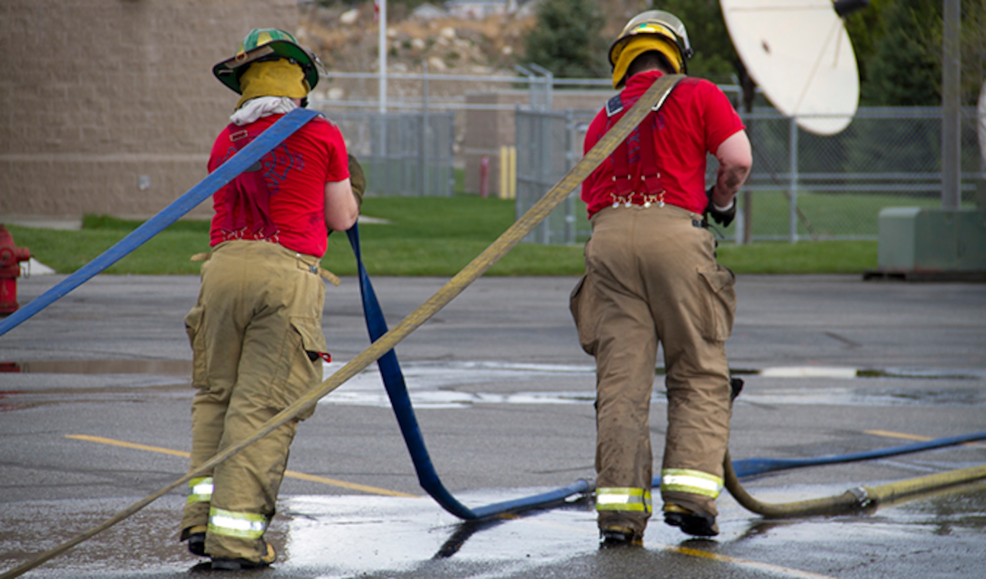 Spokane County Fire District 10 firefighters train during a West Plains Academy course December 4, 2014. After completion of the 12-week academy, firefighters continue their training with extensive emergency medical technician training and perfecting basic firefighting skills. (Courtesy Photo)