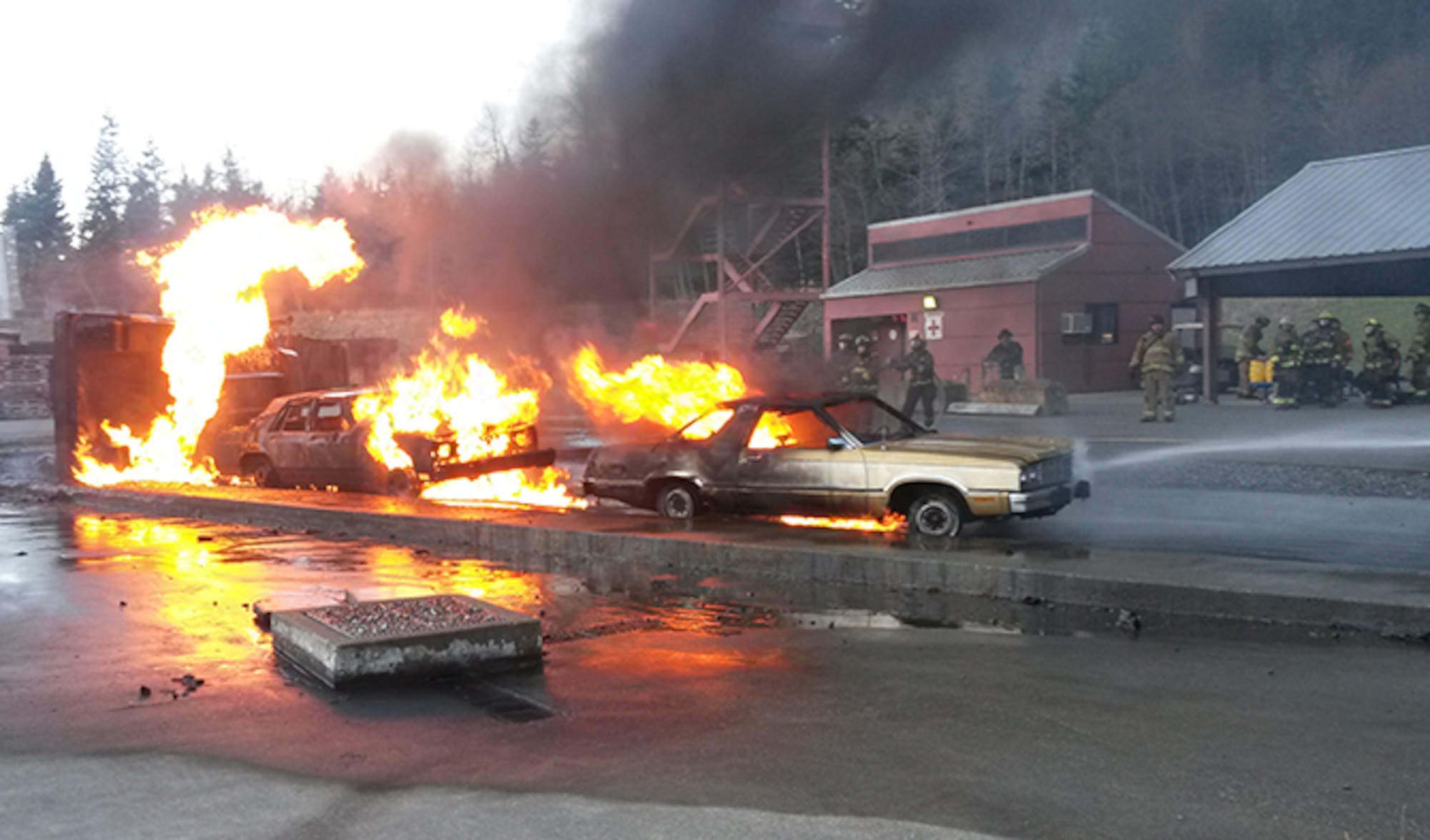 Members of the Spokane County Fire District 10 participate in an exercise during a West Plains Academy course December 14, 2014. The education conducted through the West Plains Academy curriculum arms volunteers with the skills, certifications and experience needed to find a career firefighting position after three to four years of dedicated volunteer service. (Courtesy Photo)