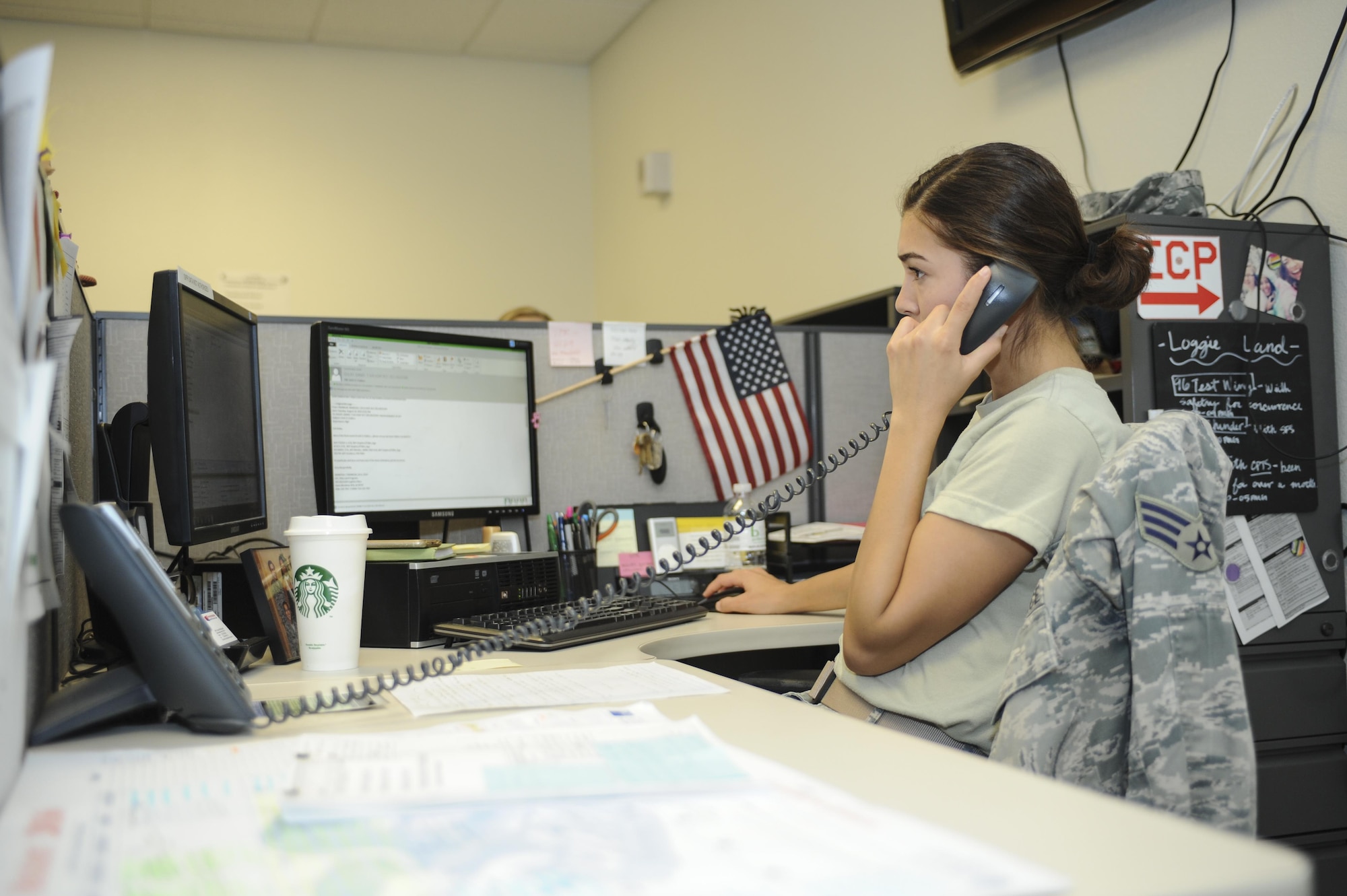 U.S. Air Force Senior Airman Corina Delgado, 355th Logistics Readiness Squadron logistics planner, responds to an incoming call at Davis-Monthan Air Force Base, Ariz., Aug. 16, 2016. In the year of 2016, the 355th LRS logistics planners have deployed approximately 1,000 personnel and have deployed roughly forty percent of that within this past July, resulting in 422 personnel and 3.7 tons of cargo.  (U.S. Air Force photo Airman 1st Class Mya M. Crosby) 