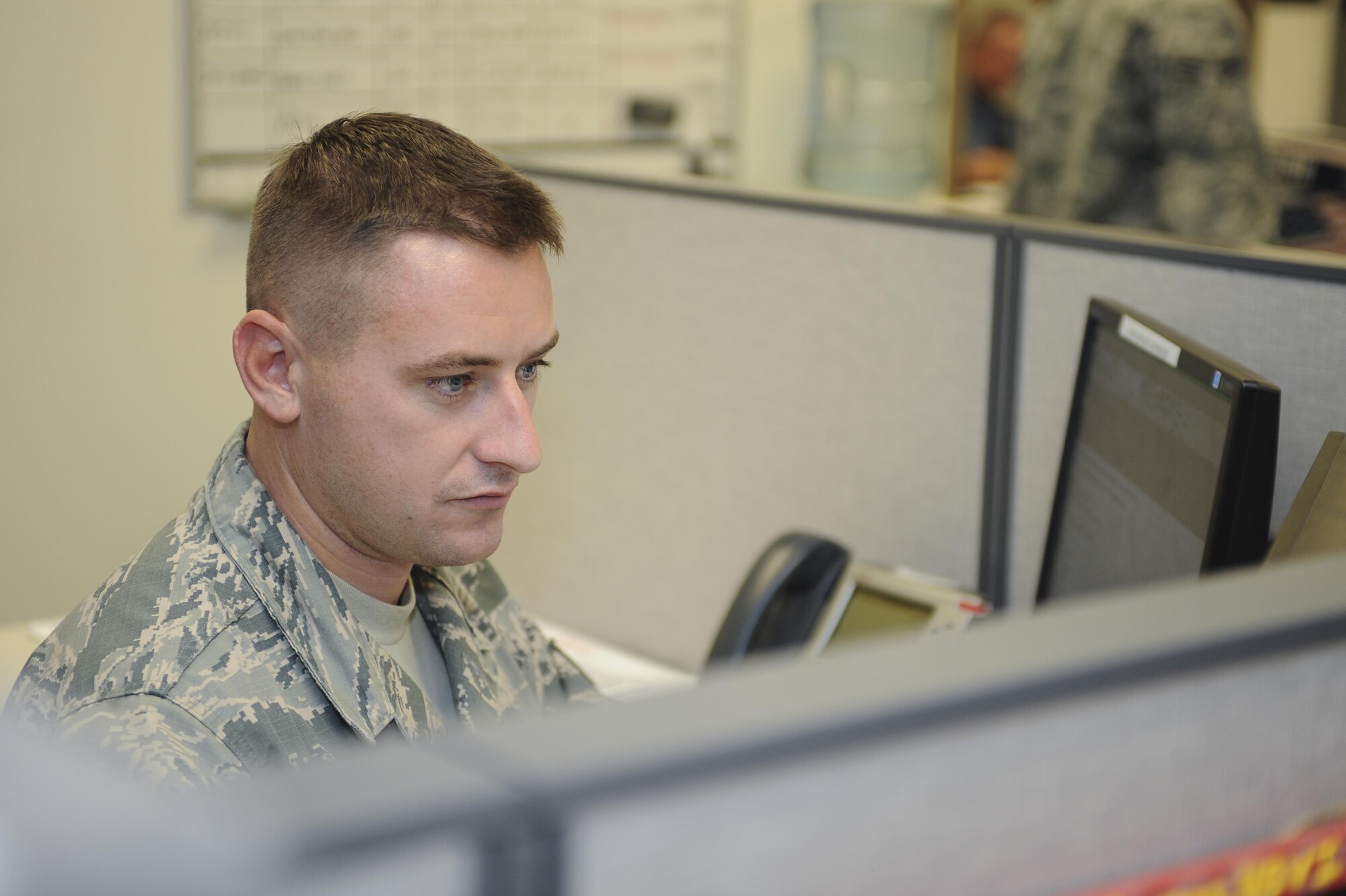 U.S. Staff Sgt. Brian Bober, 355th Logistics Readiness Squadron NCO in charge of deployments, checks his email at Davis-Monthan Air Force Base, Ariz., Aug. 16, 2016. Logistics planners are responsible for supervising deployments, redeployments and maintaining a close relationship between operations, logistics and support organizations to enhance support of the combat mission and develop crisis action procedures. (U.S. Air Force photo by Airman 1st Class Mya M. Crosby)