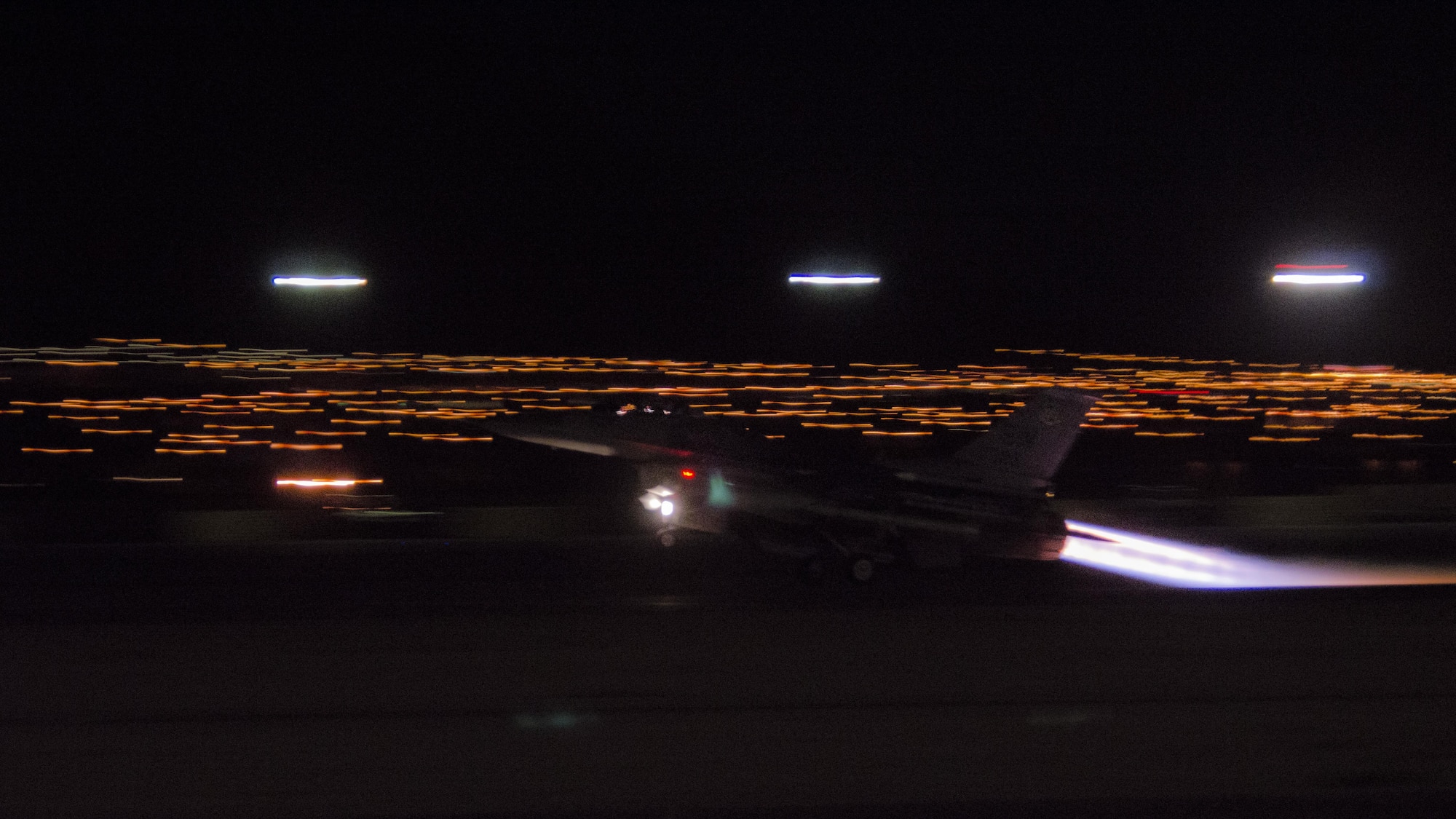 An F-16CM Fighting Falcon from the 55th Fighter Squadron, Shaw Air Force Base, S.C., takes off while conducting a night sortie during exercise Red Flag 16-4 at Nellis AFB, Nev., Aug. 17, 2016. The 55th FS played a key role during the exercise by providing suppression of enemy air defenses. (U. S. Air Force photo by Tech. Sgt. Frank Miller)