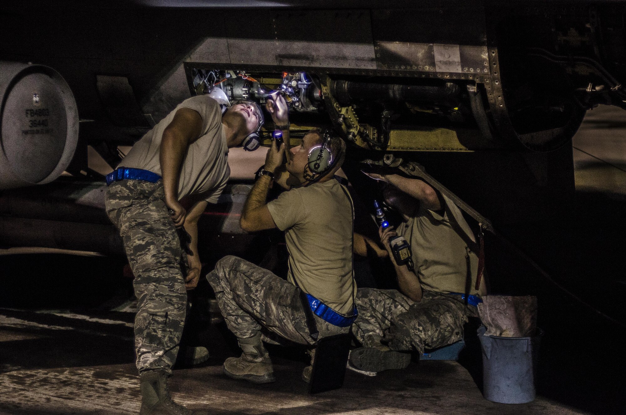 U.S. Air Force maintainers from the 20th Maintenance Squadron, Shooters Aircraft Maintenance Unit, service an F-16CM Fighting Falcon during Red Flag 16-4 at Nellis Air Force Base, Nev., Aug. 17, 2016. Maintainers played a key role in ensuring aircraft were able to meet the demanding air tasking orders during the exercise. (U. S. Air Force photo by Tech. Sgt. Frank Miller)