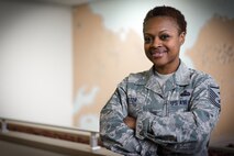 U.S. Air Force Master Sgt. Dierdre Mister, 36th Airlift Squadron first sergeant, stand inside of the Red Flag-Alaska building on Joint Base Elmendorf-Richardson, Alaska, Aug. 19, 2016. Mister had the opportunity to be the JBER RF-A first sergeant and was able to get a firsthand look at what her unit does in the field. (U.S. Air Force photo by Staff Sgt. Michael Smith/Released)