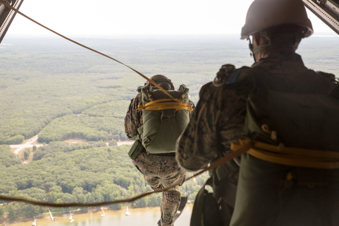CAMP GRAYLING, Mich. – Marines with 4th Reconnaissance Battalion, 4th Marine Division, Marine Forces Reserve, jump from the back of a C-130 during Exercise Northern Strike 2016 at Camp Grayling Joint Maneuver Training Center, Mich., Aug. 17, 2016. The Marines demonstrated their skills and kept their qualifications up to date.  Exercise Northern Strike 16 is a National Guard Bureau-sponsored exercise uniting approximately 5,000 Army, Air Force, Marine, and Special Forces service members from 20 states and three coalition countries. The exercise strives to provide accessible, readiness-building opportunities for military units from all service branches to achieve and sustain proficiency in conducting mission command, air, sea, and ground maneuver integration, and the synchronization of fires in a joint, multinational, decisive action environment. (U.S. Marine Corps photo by Cpl. Devan Alonzo Barnett/Released)
