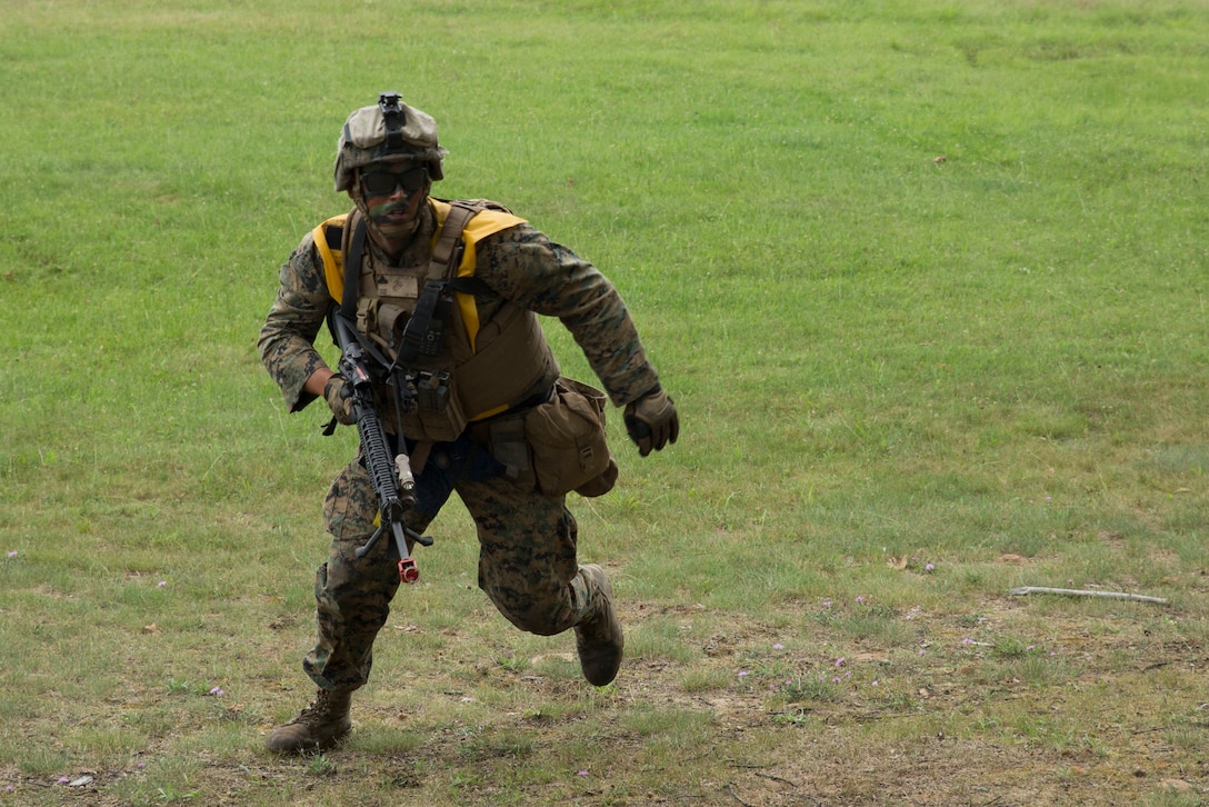CAMP GRAYLING, Mich. -- A Marine with 4th Assault Amphibian Battalion, 4th Marine Division, Marine Forces Reserve, practices his maneuver under fire during Exercise Northern Strike 2016 at Camp Grayling Joint Maneuver Training Center, Mich., Aug. 17, 2016. The exercise also included infantry training techniques and military operations in urban terrain.  Exercise Northern Strike Northern Strike 16 is a National Guard Bureau-sponsored exercise uniting approximately 5,000 Army, Air Force, Marine, and Special Forces service members from 20 states and three coalition countries. The exercise strives to provide accessible, readiness-building opportunities for military units from all service branches to achieve and sustain proficiency in conducting mission command, air, sea, and ground maneuver integration, and the synchronization of fires in a joint, multinational, decisive action environment. (U.S. Marine Corps photo by Cpl. Devan Alonzo Barnett/Released)