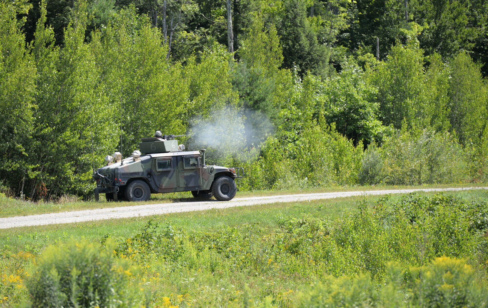 U.S. Army Soldiers with the Military Police Company, New Hampshire Army National Guard, practice convoy tactics during training Aug. 7, 2016 at Camp Ethan Allan, Vt. (Air National Guard photo by Airman 1st Class Ashlyn J. Correia)