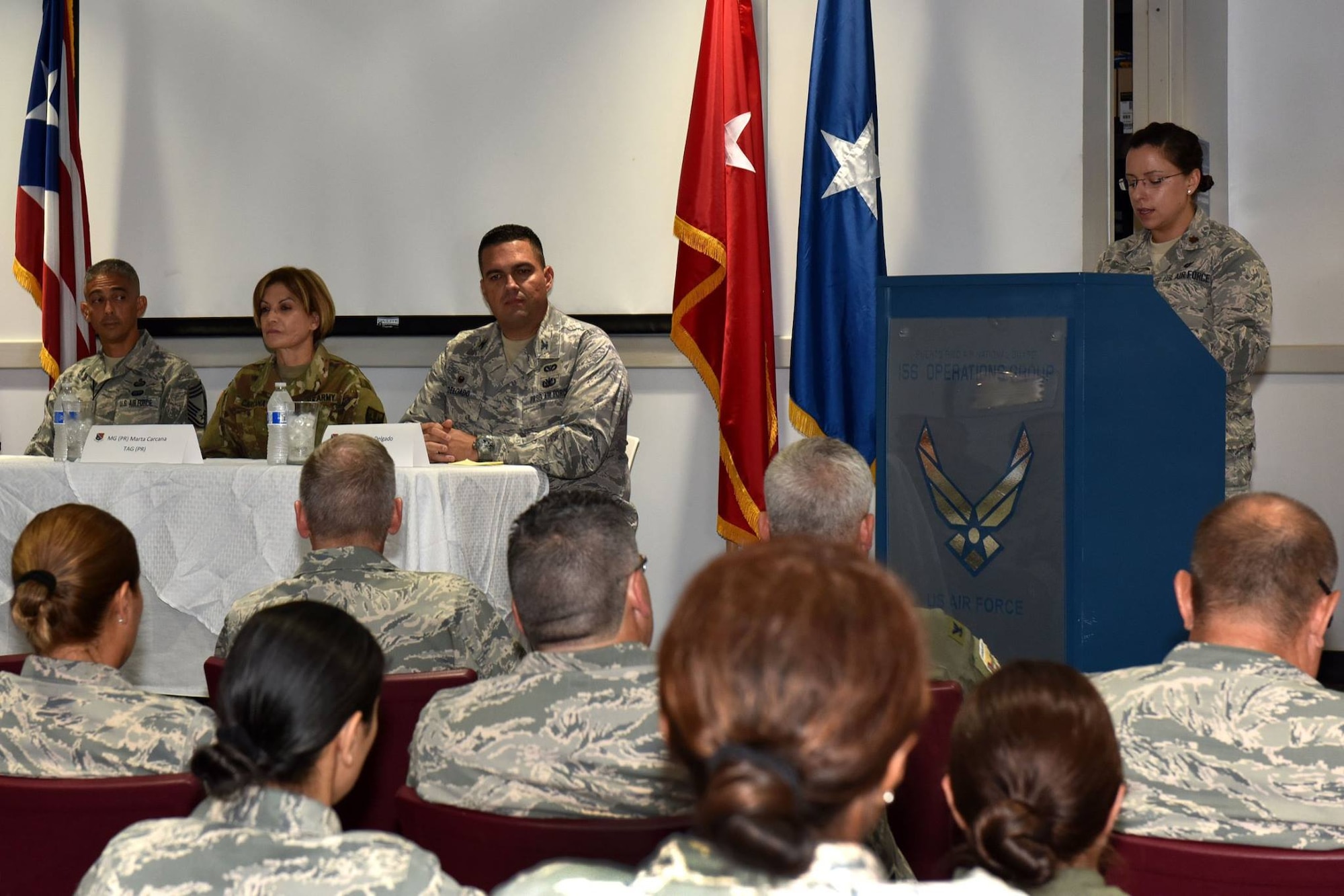 Maj. Frances Romero, 156th Airlift Wing Lean In facilitator, asks questions of a panel of distinguished guests at a Lean In circle meeting at the Muniz Air National Guard Base, Puerto Rico, August 13, 2016. The Las Bucaneras Lean In Circle is a group of military professionals from the 156th Airlift Wing whose mission is the provide women from the Puerto Rico Air National Guard a platform for mentorship and support through personal and professional development. (U.S. Air National Guard photo by Tech. Sgt. Efrain Sanchez)