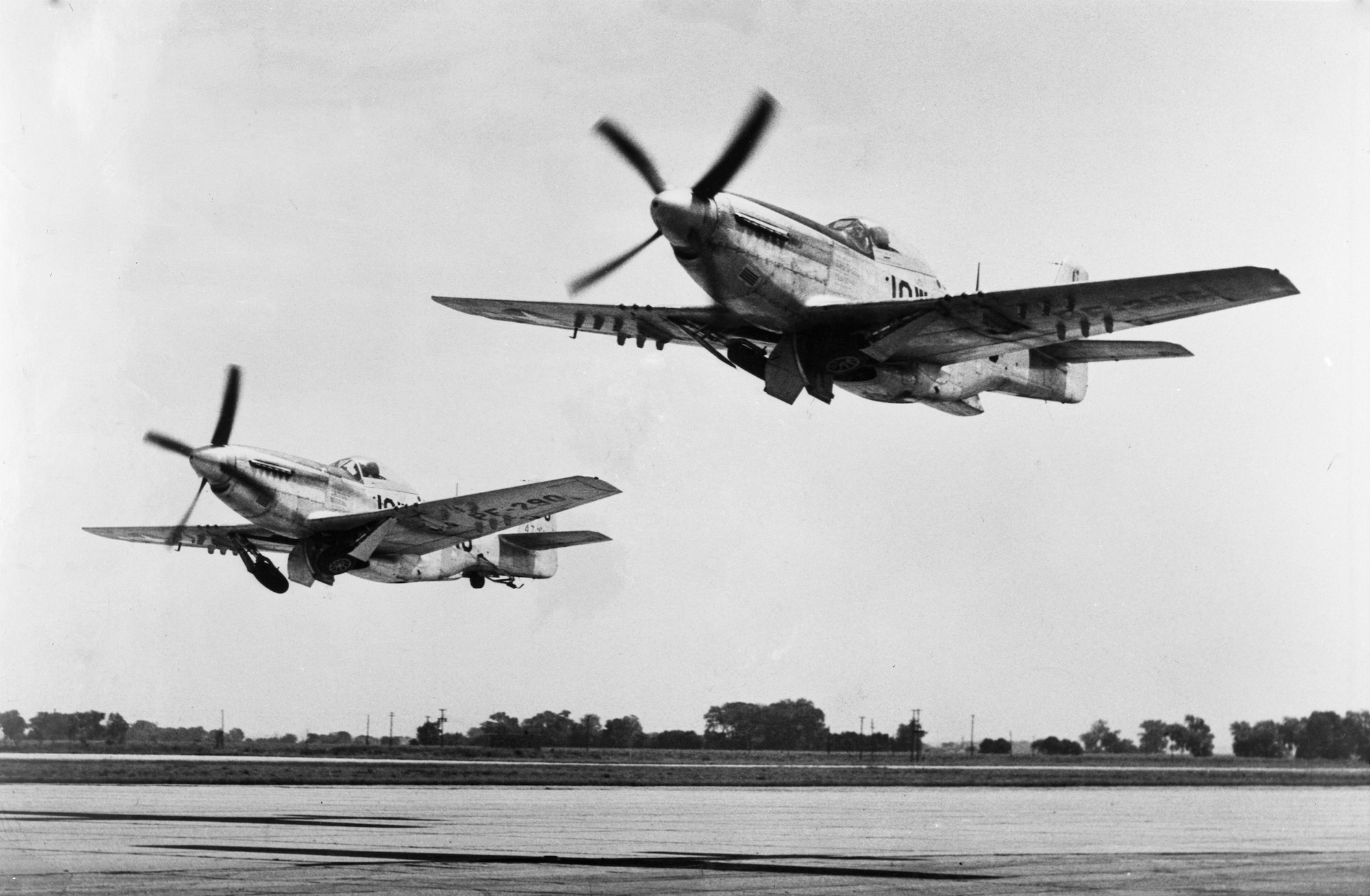 Two P-51 fighter aircraft assigned to the 174th Fighter Squadron, Iowa National Guard take off at the airport in Sioux City, Iowa in the spring of 1948. The Mustangs were the first aircraft assigned to the newly organized air arm of the Iowa National Guard when it was first organized in 1946.
185th ARW Photo/ Released
