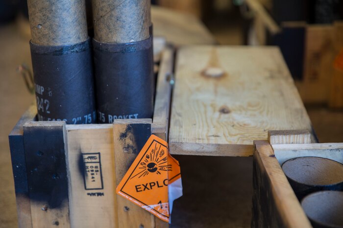 Boxes of 2.75-inch high explosive rockets wait to be assembled during Southern Frontier at Royal Australian Air Force Base Tindal, Australia, Aug. 24, 2016. Southern Frontier afforded Iwakuni Marines the opportunity to train with high explosive weapon body groups typically not used in Japan, while expanding technical and tactical proficiency in their craft. Munitions built during this training are in support of Marine Fighter Attack Squadron (VMFA) 122, who also gain experience and qualifications in low altitude, air-ground, high explosive ordnance delivery at the unit level. (U.S. Marine Corps photo by Cpl. Nicole Zurbrugg)