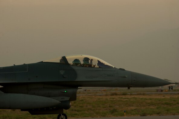 An F-16C pilot prepares to taxi down the runway prior to taking off for a mission Aug. 22, 2016, Bagram Airfield, Afghanistan. The F-16s based out of Bagram, are the only dedicated fighter squadron in the country and continuously supports Operation Freedom’s Sentinel and the NATO Resolute Support mission. (U.S. Air Force photo by Capt. Korey Fratini)