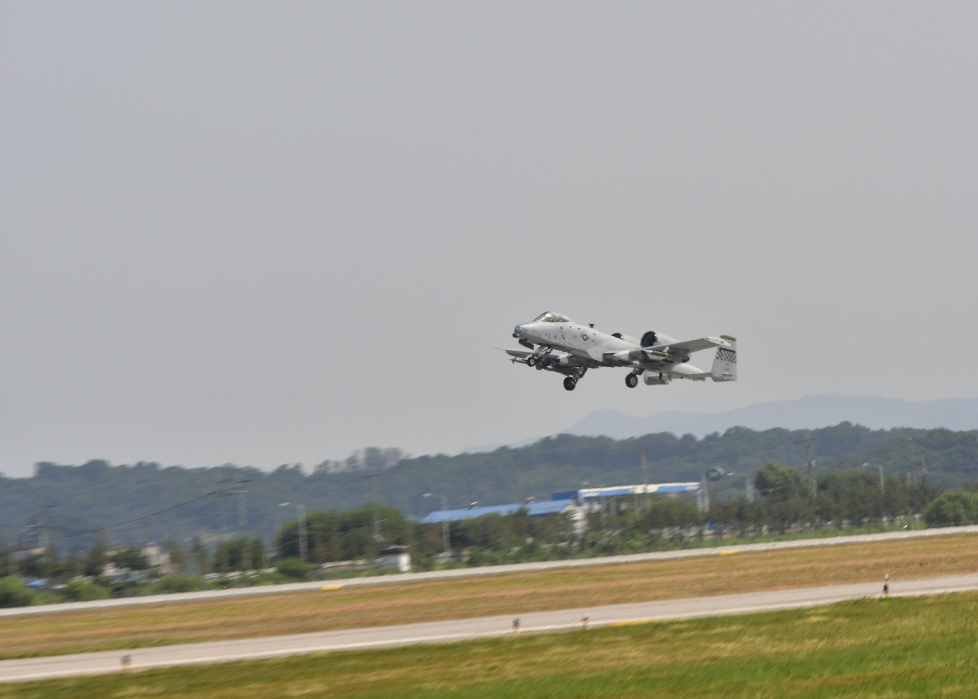 An A-10 Thunderbolt II, assigned to the 25th Fighter Squadron, takes off for a sortie in support of Exercise Beverly Herd 16-2 at Osan Air Base, Republic of Korea, Aug. 24, 2016. Beverly Herd provides an opportunity for Team Osan to practice wartime procedures in a realistic environment. (U.S. Air Force photo by Senior Airman Victor J. Caputo)