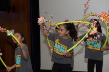 A group of girls representing Filipino culture perform the Bulaklakan, a flower dance, during the fashion show at Multicultural Awareness Day Aug. 18, 2016 at Club Eifel, Spangdahlem Air Base, Germany. Multicultural Day at Spangdahlem offered attendees culturally diverse performances and foods and more than 21 multicultural displays. (U.S. Air Force photo by Tech. Sgt. Amanda Currier)  