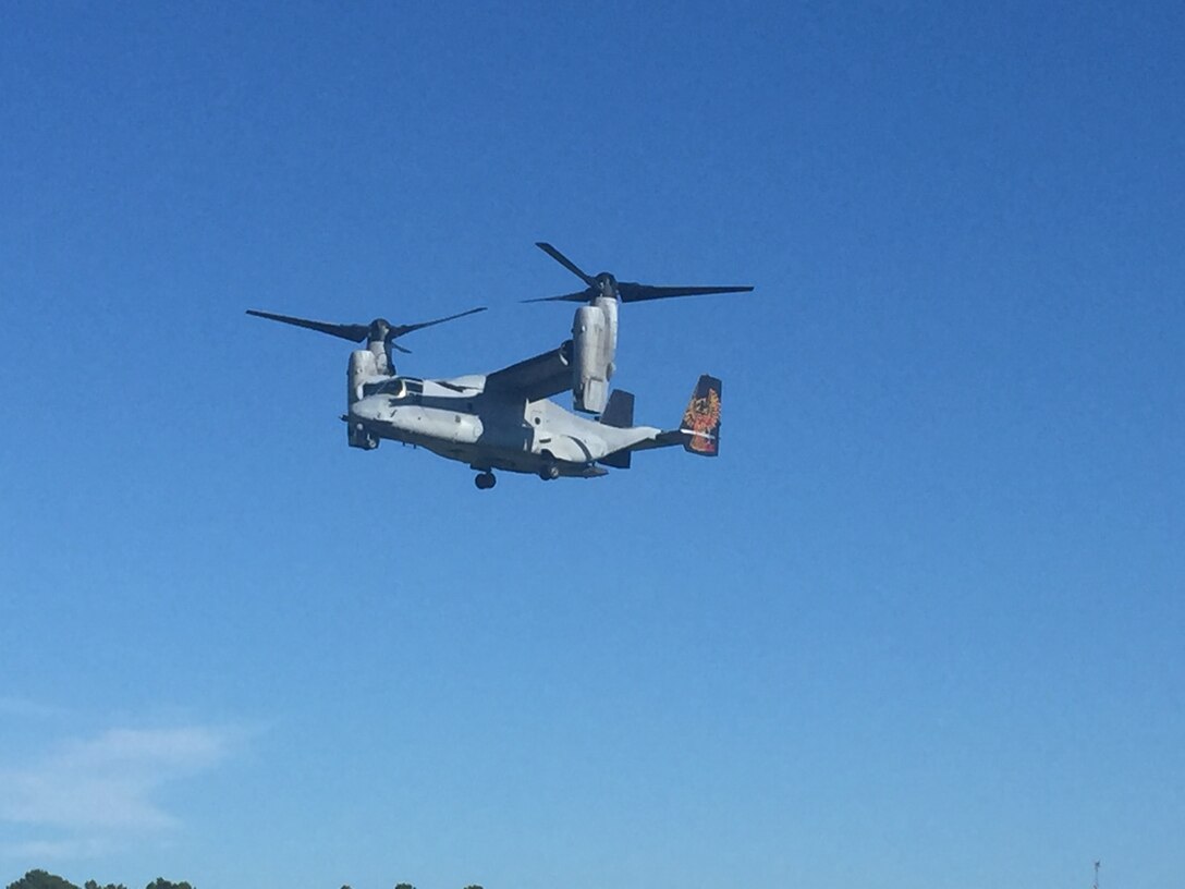 Marines with 2nd Air Delivery, 2nd Transportation Support Battalion prepare to jump out of an MV-22 Osprey to qualify with the MC-7 parachute at Camp Davis, N.C. Aug. 17, 2016. The Marines are jumping with the newly issued Marine Corps MC-7 parachute to become certified as a basic airborne jumper. (U.S. Marine Corps photo by Lance Cpl. Ashley Lawson) 160817-M-IH158 -005