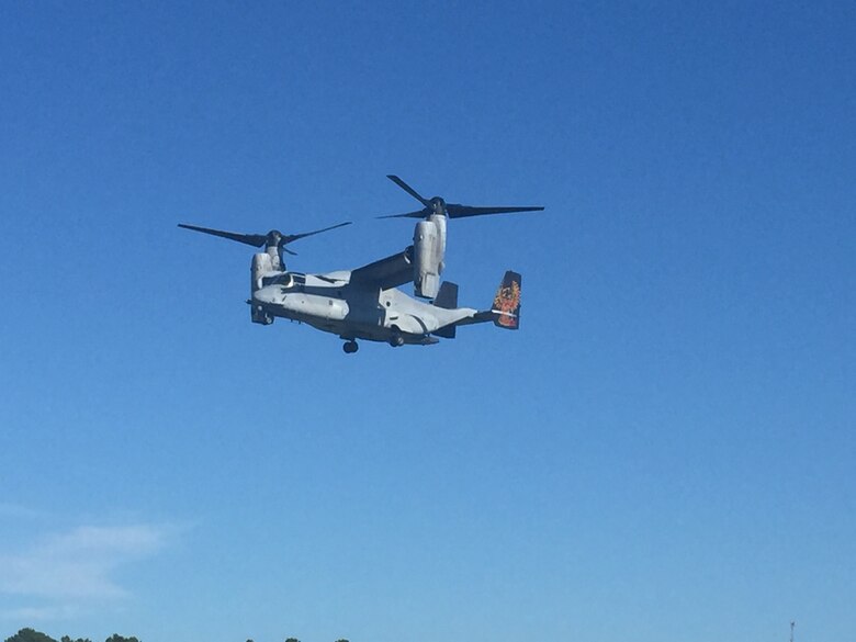 Marines with 2nd Air Delivery, 2nd Transportation Support Battalion prepare to jump out of an MV-22 Osprey to qualify with the MC-7 parachute at Camp Davis, N.C. Aug. 17, 2016. The Marines are jumping with the newly issued Marine Corps MC-7 parachute to become certified as a basic airborne jumper. (U.S. Marine Corps photo by Lance Cpl. Ashley Lawson) 160817-M-IH158 -005