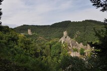 Two castles, embedded in beautiful nature are admired year-round by many visitors of the Eifel region. Once a year, one of the two castles, the Niederburg or lower castle becomes the site for a popular event, the Manderscheid medieval castle festival. During the annual event, knights on horses will battle with lances and swords, with bows and spears. The jousting tournaments are always among the highlights of the annual event as well as the fireworks display, scheduled for 10:15 p.m., Aug. 27.  Manderscheid is located north of the Moselle River, directly north of Autobahn A48. (U.S. Air Force photo by Iris Reiff/Released) 