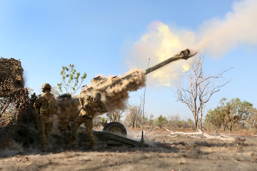 Australian Army soldiers with 8/12 Regiment, fire a M-777 Howitzer in support of U.S. Marines on the ground August 11, 2016 at Bradshaw Field Training Area, Northern Territory, Australia. The soldiers and Marines are taking part in Exercise Koolendong 16, a trilateral exercise between the Australian Defence Force, U.S. Marine Corps and French Armed Forces New Caledonia. (U.S. Marine Corps photo by Sgt. Sarah Anderson)