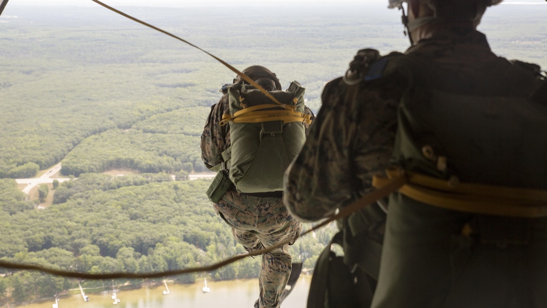 Marines with 4th Reconnaissance Battalion, 4th Marine Division, Marine Forces Reserve, jump from the back of a C-130 during Exercise Northern Strike 2016 at Camp Grayling Joint Maneuver Training Center, Mich., Aug. 17, 2016. The Marines demonstrated their skills and kept their qualifications up to date.  Exercise Northern Strike 16 is a National Guard Bureau-sponsored exercise uniting approximately 5,000 Army, Air Force, Marine, and Special Forces service members from 20 states and three coalition countries. The exercise strives to provide accessible, readiness-building opportunities for military units from all service branches to achieve and sustain proficiency in conducting mission command, air, sea, and ground maneuver integration, and the synchronization of fires in a joint, multinational, decisive action environment.