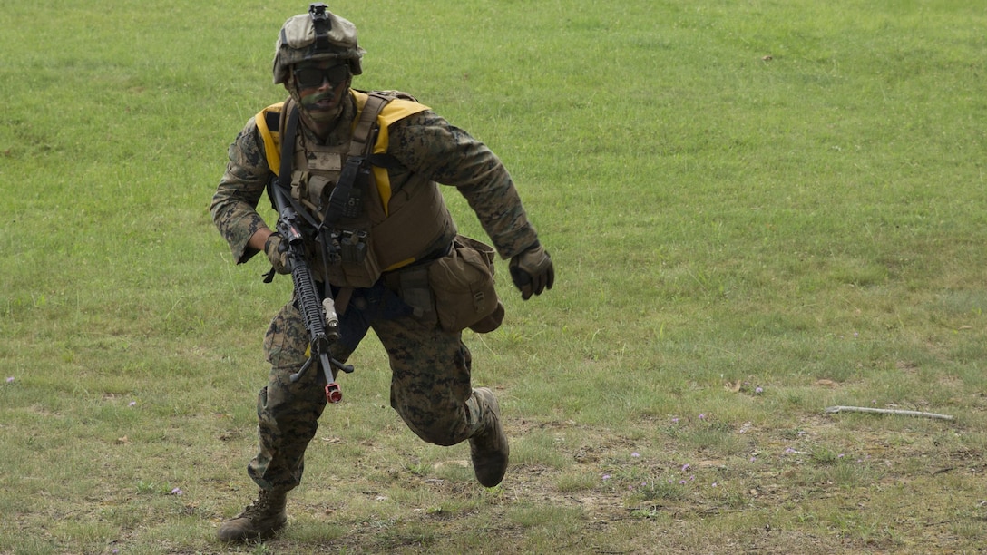 A Marine with 4th Assault Amphibian Battalion, 4th Marine Division, Marine Forces Reserve, practices his maneuver under fire during Exercise Northern Strike 2016 at Camp Grayling Joint Maneuver Training Center, Mich., Aug. 17, 2016. The exercise also included infantry training techniques and military operations in urban terrain.  Exercise Northern Strike Northern Strike 16 is a National Guard Bureau-sponsored exercise uniting approximately 5,000 Army, Air Force, Marine, and Special Forces service members from 20 states and three coalition countries. The exercise strives to provide accessible, readiness-building opportunities for military units from all service branches to achieve and sustain proficiency in conducting mission command, air, sea, and ground maneuver integration, and the synchronization of fires in a joint, multinational, decisive action environment.