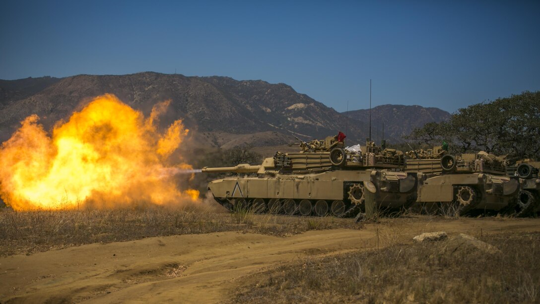 Marines with Company A, 4th Tank Battalion, 4th Marine Division, Marine Forces Reserve, fire a M1A1 Abrams Main Battle Tank during their annual training at Marine Corps Base Camp Pendleton, Calif., July 19, 2016. Marines fired the tanks to adjust their battle sight zero before the main event of their annual training.