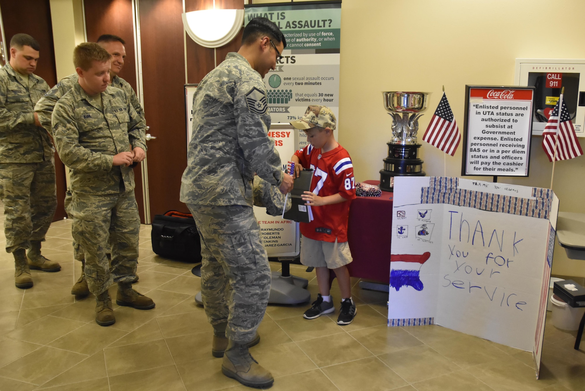 Ten-year old Jeffrey from Agawam, Mass. shakes hands and obtains the autographs of more than 200 Airmen during lunch hour at the Westover Consolidated Club on August 7, 2016. Jeffrey is on a mission to see how many veterans he can thank before Veteran's Day this year. 