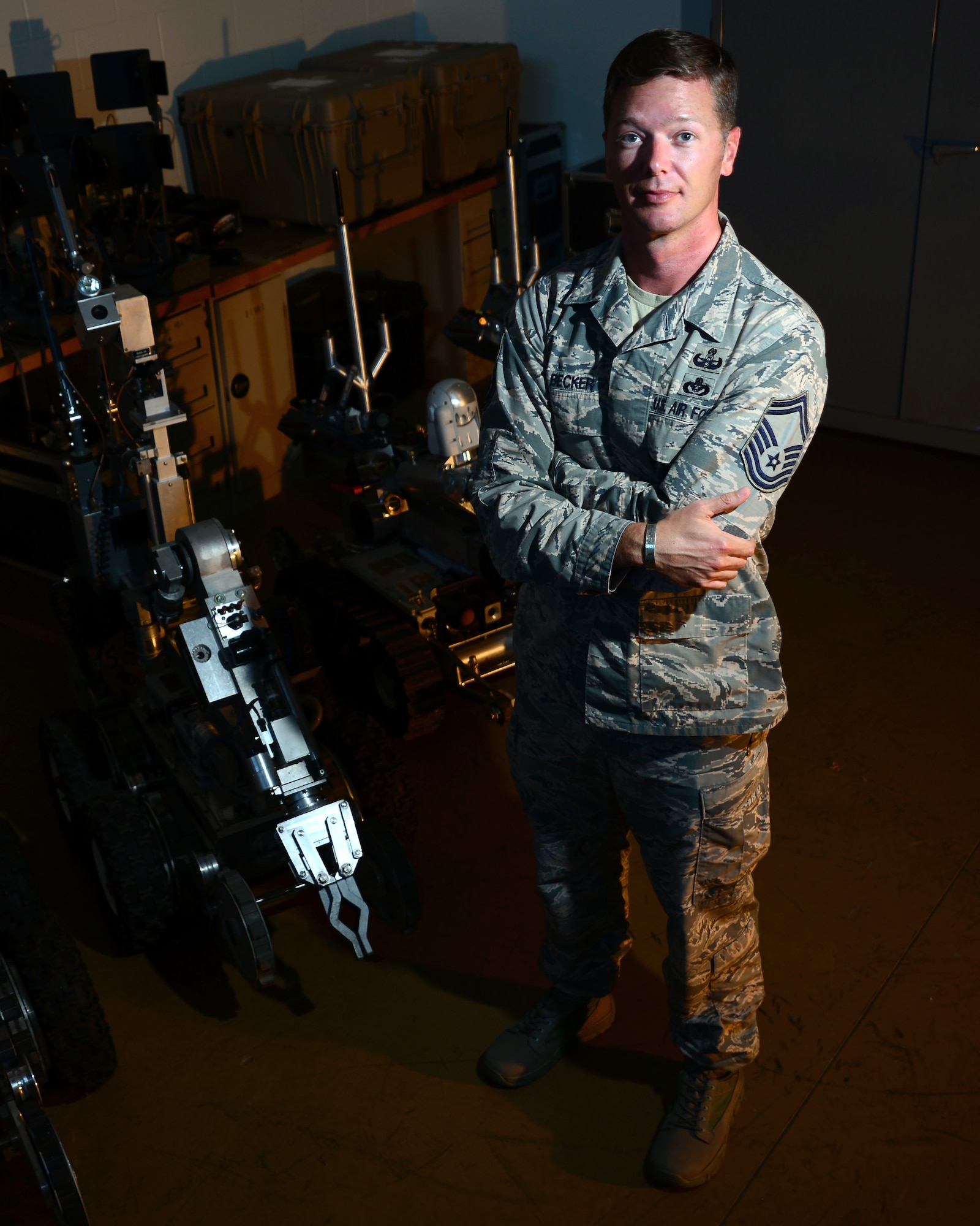U.S. Air Force Senior Master Sgt. Michael Becker, the explosive ordnance disposal (EOD) flight chief assigned to the 509th Civil Engineer Squadron, poses next to a F6A robot at Whiteman Air Force Base, Mo., Aug. 22, 2016. Becker is the Air Force recipient of the 2016 Jewish Institute for National Security Affairs Grateful Nation Award for his superior conduct in the war on terrorism and designing new state-of-the-art robotics systems to keep Airmen safe inside assault vehicles during missions. (U.S. Air Force photo by Senior Airman Danielle Quilla)