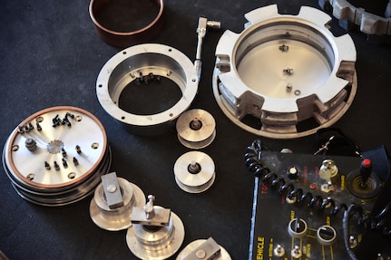Screws and components of the Northrop Grumman Remotec’s ANDROS F6A explosive ordnance disposal robot, are set aside and cleaned prior to reassembly during an advanced maintenance course at Peterson Air Force Base, Colo., Aug. 17, 2016. The 21st EOD leadership arrange this training for their Airman and invited the 140th Wing CES EOD out of Buckley Air Force Base, Colo., the 302nd Airlift Wing CES EOD at Peterson AFB, Colo., and the El Paso County bomb squad to attend. (U.S. Air Force photo by Staff Sgt. Amber Grimm) 