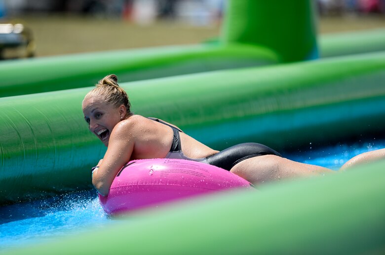 Krystal Conkling screams while going down a giant slip-and-slide during Slide the City at Schriever Air Force Base, Colorado, Friday, Aug. 19, 2016. Conkling was one of the more than 370 participants who tubed down the slide. (U.S. Air Force photo/Christopher DeWitt)