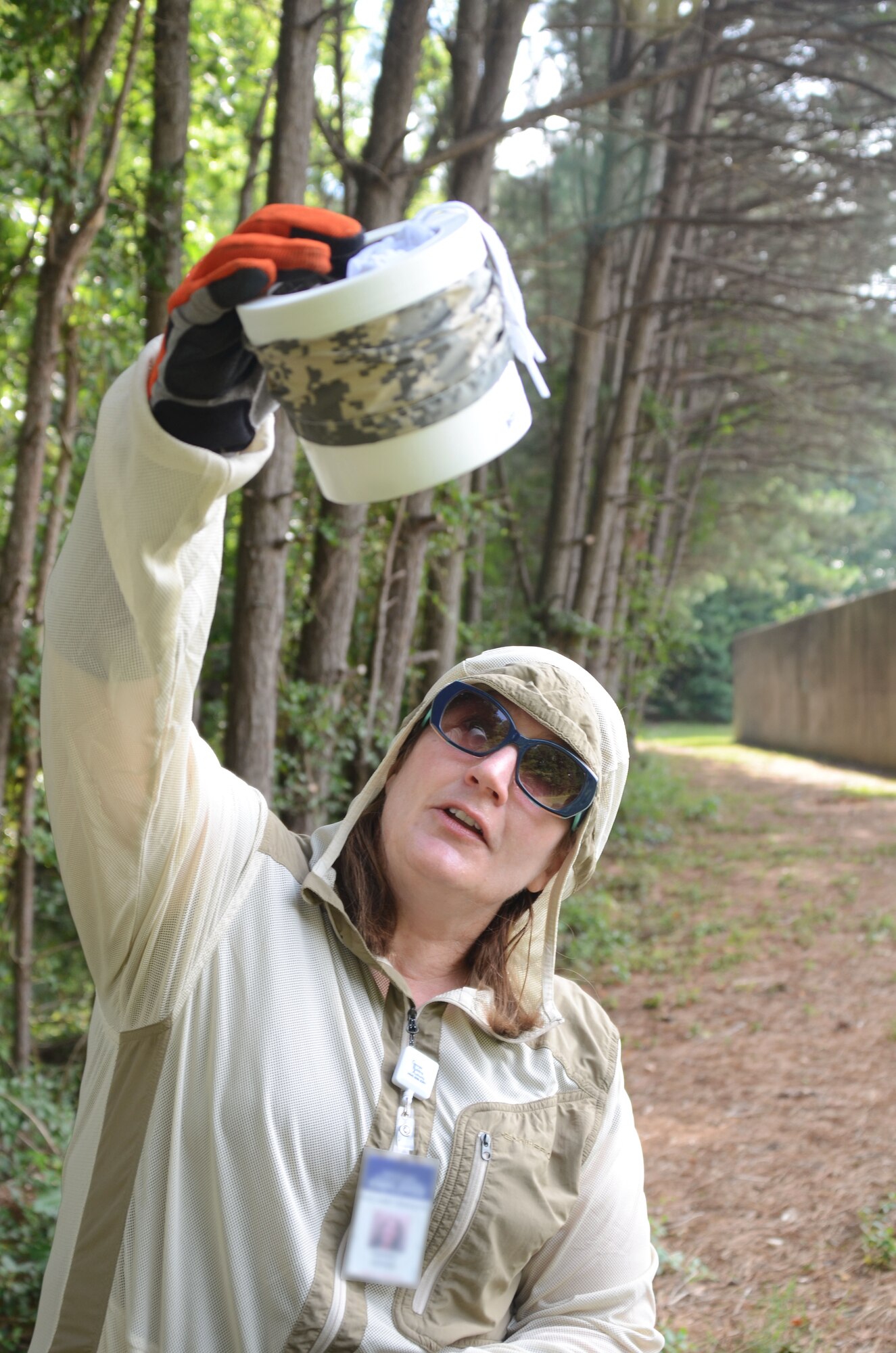 Kathleen Schmidt, from the State of Georgia Public Health Department, examines a mosquito trap to be sent for testing of the zika virus, on Dobbins Air Reserve Base, Ga., on June 24, 2016. The traps were placed in close proximity to where recent bites were experienced by base personnel (U.S. Air Force photos/Don Peek)