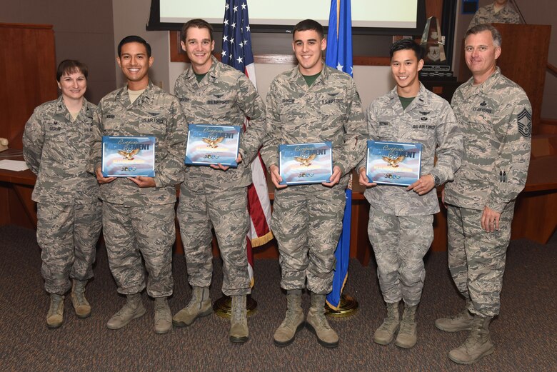 Senior Airman Austin Johnson, 2nd Range Operations Squadron aerospace clearance officer, 1st Lt. Andrew Marin, 2 ROPS range control officer, 1st Lt. Kyle Schroeder, 2 ROPS range control officer, and 1st Lt. Christopher Huynh, 2 ROPS range operations commander, are recognized by Col. Jennifer Grant, 30th Operations Group commander, and Chief Master Sgt. Thomas O’Malley, 30th OG superintendent, Aug. 19, 2016, Vandenberg Air Force Base, Calif. Created to mirror Air Force Space Command’s Guardian Challenge, Top Hawk pits 30th OG launch teams against each other in a series of challenges designed to test job knowledge and performance. (U.S. Air Force photo by Airman 1st Class Robert J. Volio/Released)