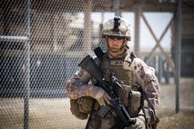 U.S. Marines and Sailors with Regional Corps Battle School, alongside the Marines with 2nd Battalion 8th Marines, Regimental Combat Team 7, mentor and train Afghan National Army mortar men at a mortar range outside Camp Shorabak, Helmand province, Afghanistan, May 4, 2013. The Marines with RCBS, were training the ANA soldiers to improve on their proficiency of the 60 MM mortar weapons system. (U.S. Marine Corps photo by Staff Sgt. Ezekiel R. Kitandwe/Released)
