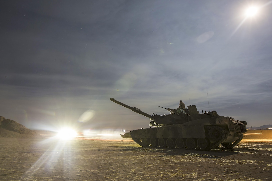 A Marine Corps M1A1 tank conducts tactical training during Large Scale Exercise 2016 at Marine Corps Air Ground Combat Center Twentynine Palms, Calif., Aug. 16, 2016. The goal of the exercise is to enhance interoperability among thousands of Marines. Marine Corps photo by Cpl. Clarence A. Leake