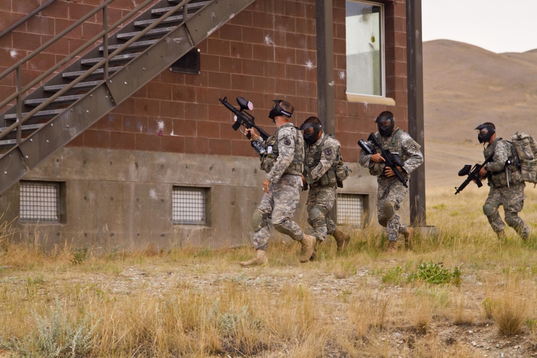 The 2016 U.S. Army Reserve Best Warrior winners and runner-ups navigate an urban terrain site during training at Fort Harrison, Mont., August 5, 2016. The USAR BWC winners from the noncommissioned officer and Soldier category are going through rigorous training, leading up to their appearance at Fort A.P. Hill later this year for the Department of Army BWC. (U.S. Army Reserve photo by  Brian Godette, USARC Public Affairs)