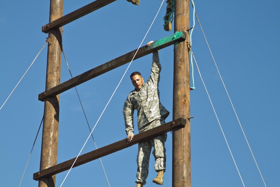 Sgt. 1st Class Joshua A. Moeller, U.S. Army Reserve Best Warrior Competition noncommissioned officer winner, navigates a section of the obstacle course during  training at Fort Harrison, Mont., August 5, 2016. The USAR BWC winners from the NCO and Soldier category are going through rigorous training, leading up to their appearance at Fort A.P. Hill later this year for the Department of Army BWC. (U.S. Army Reserve photo by  Brian Godette, USARC Public Affairs)