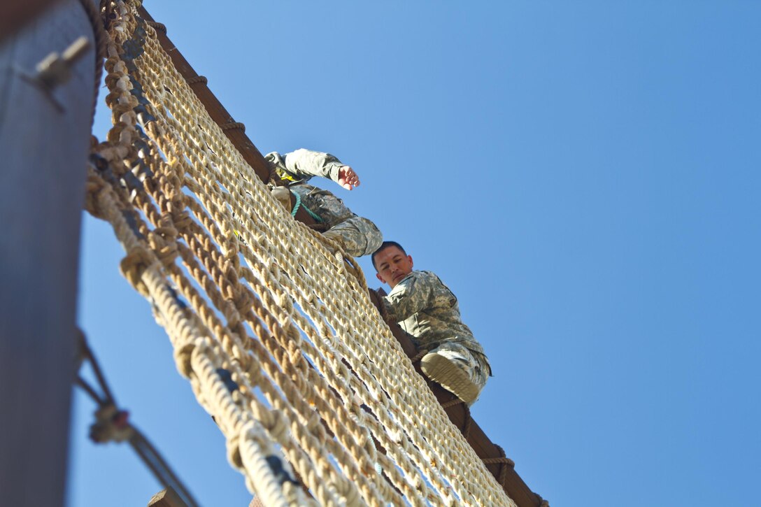 Spc. Michael S. Orozco, U.S. Army Reserve Best Warrior Competition winner in the Soldier category, navigates a section of the obstacle course during  training at Fort Harrison, Mont., August 5, 2016. The USAR BWC winners from the NCO and Soldier category are going through rigorous training, leading up to their appearance at Fort A.P. Hill later this year for the Department of Army BWC. (U.S. Army Reserve photo by  Brian Godette, USARC Public Affairs)(U.S. Army Reserve photo by  Brian Godette, USARC Public Affairs)