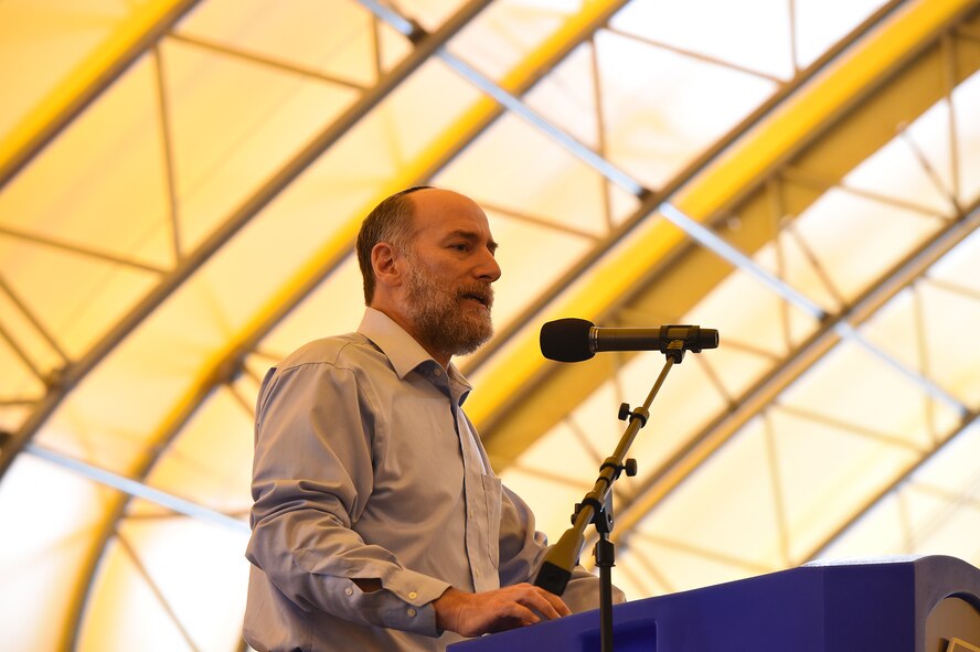 Joe Charnes, a Jewish lecturer, speaks to the audience during the Holocaust Remembrance Day event at Schriever Air Force Base, Colorado, Tuesday, Aug. 23, 2016. Charnes spoke of the importance of accepting the differences in others in order to prevent a tragedy such as the Holocaust from occurring in the future. (U.S. Air Force photo/Airman William Tracy)